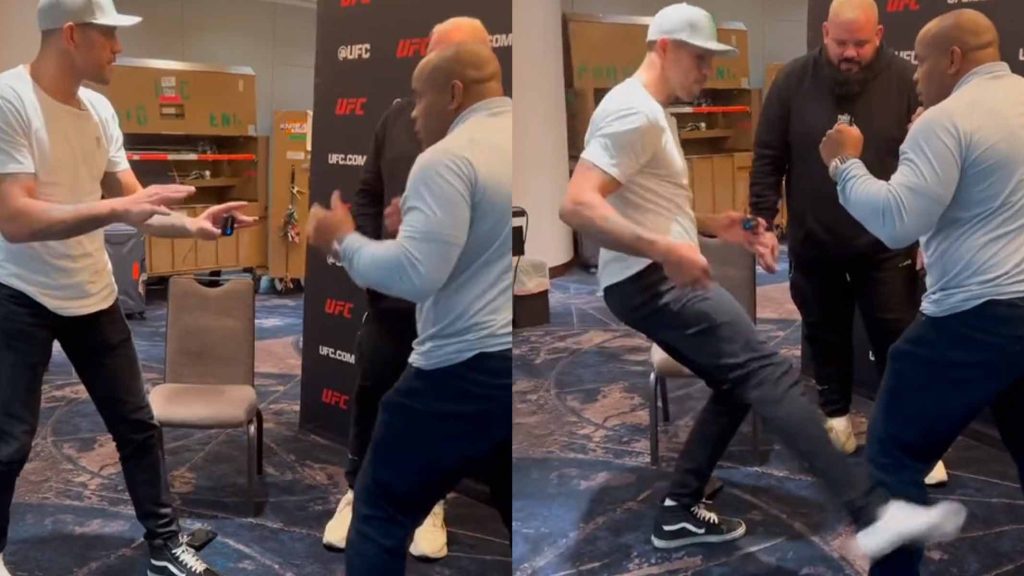 Alex Pereira frappe Daniel Cormier avec des low kicks